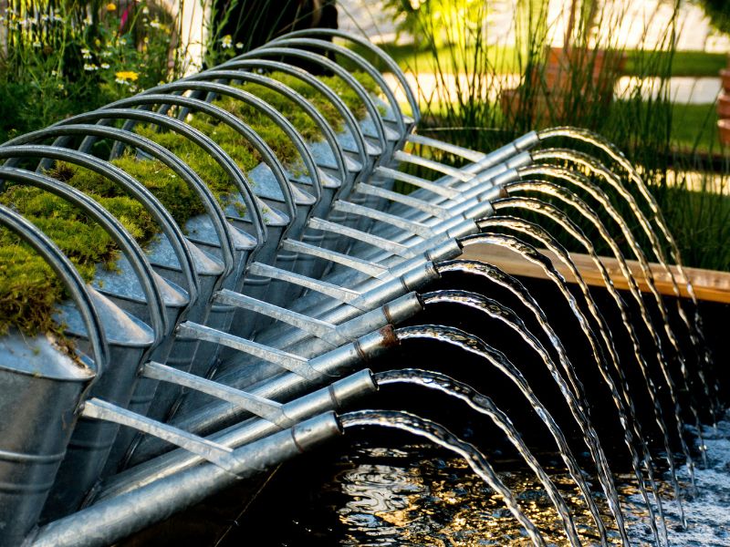 Plumber installing new PEX piping during a whole-home repipe
